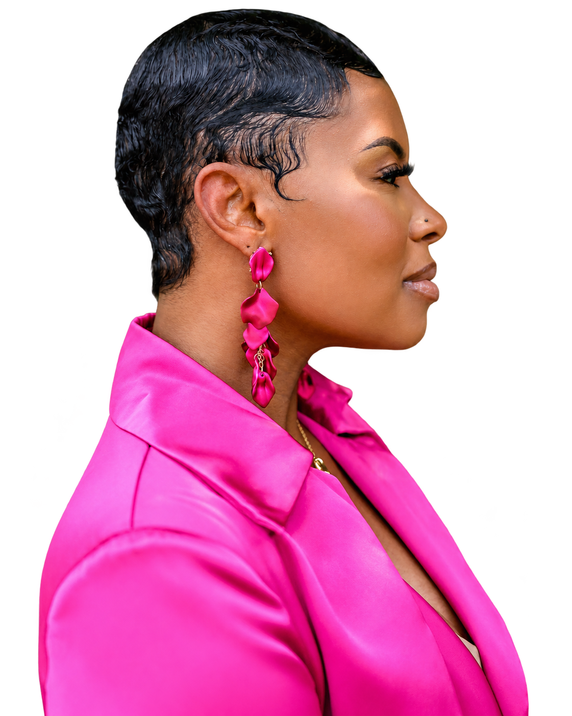 Melissa Lamb in profile, wearing a pink suit